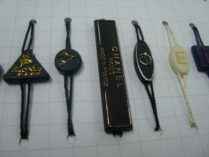 China custom plastic luggage tags with gold embossed logo self locking plastic tags on sale
