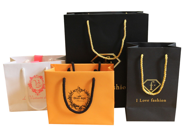  Wholesale high grade hot factory cheap printed paper carrier bags Manufactures