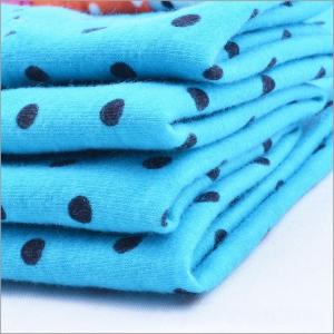 China Rusha Textile  Knitting Poly Spun Single Jersey White And Black Dot Print Fabric on sale