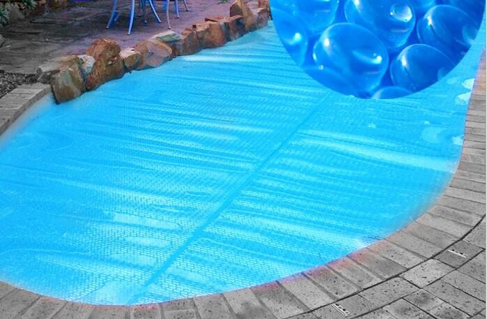 China 500um Blue Swimming Pool Solar Cover Heating Blanket For Above Ground Private Solar Pool Cover on sale