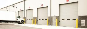  High Security Lock Sectional Overhead Doors Commercial Weather-Sealed Durable Manufactures