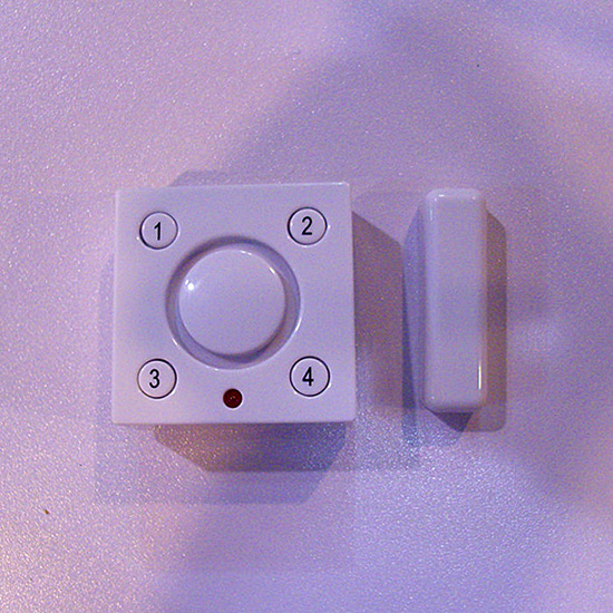 Solar power vibration/magnetic contact alarm with rechargeable Li-Ion backup batter