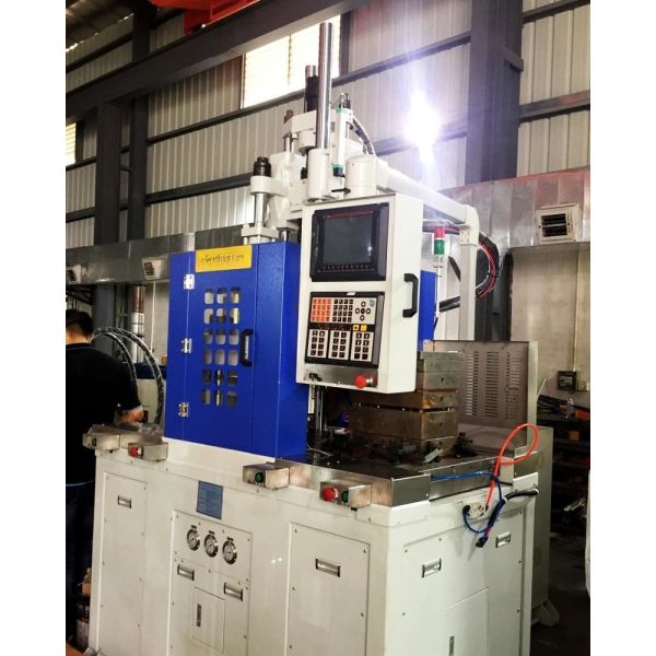 Double Slide Table Vertical Injection Molding Machine