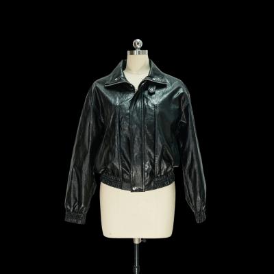 Black cropped PU leather jacket with soft texture and stand collar for a sleek street-style look
