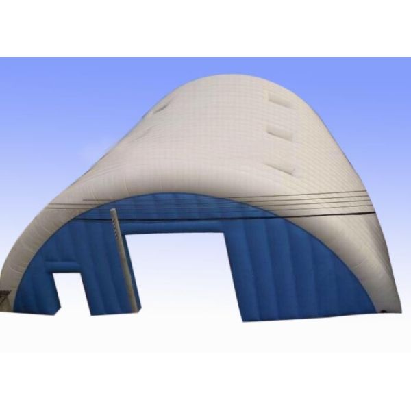 Large white and blue inflatable event tent with clear sky windows