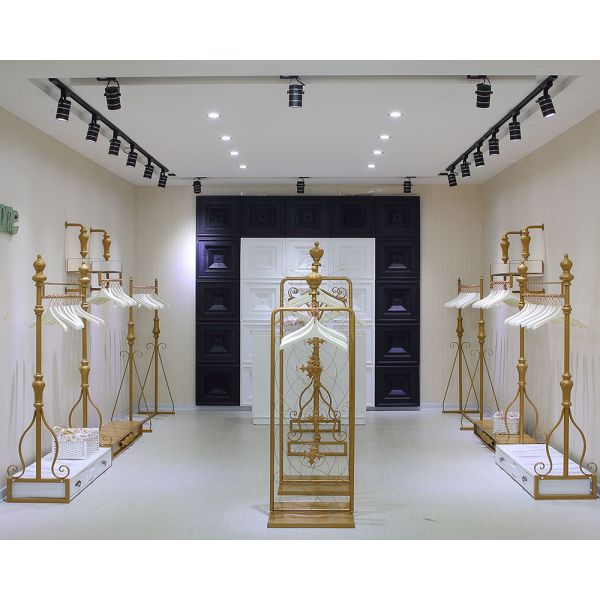 Women Clothing Store Shelves / Retail Clothing Display Systems Golden Color